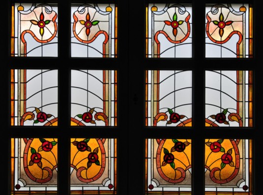 Windows with stained glass in Overlay technique